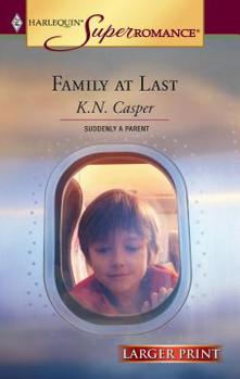 Mass Market Paperback Family at Last [Large Print] Book
