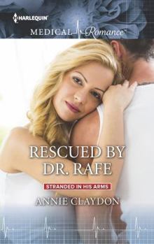 Paperback Rescued by Dr. Rafe (Stranded in His Arms, 1) Book