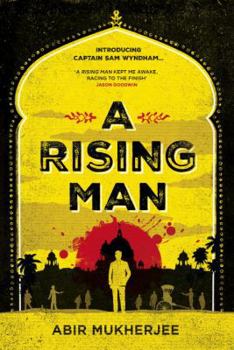 Paperback A Rising Man Book