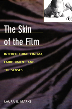 Paperback The Skin of the Film: Intercultural Cinema, Embodiment, and the Senses Book