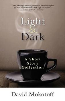 Paperback Light & Dark: A Short Story Collection Book