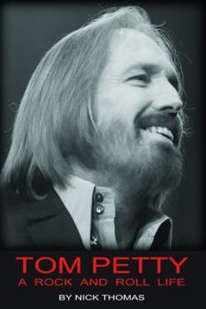 Paperback Tom Petty: A Rock And Roll Life Book