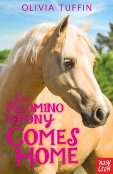 Paperback The Palomino Pony Comes Home Book