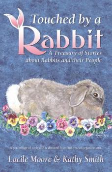 Paperback Touched by a Rabbit: A Treasury of Stories about Rabbits and Their People Book