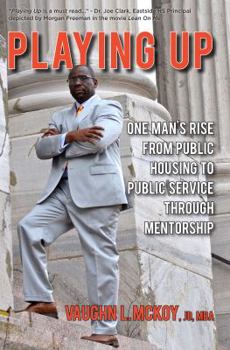 Paperback Playing Up: One Man's Rise from Public Housing to Public Service Through Mentorship Book