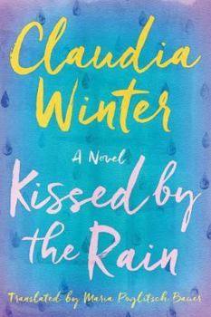 Paperback Kissed by the Rain Book