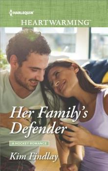 Mass Market Paperback Her Family's Defender Book