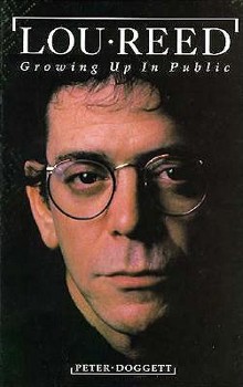 Paperback Lou Reed: Growing Up in Public Book