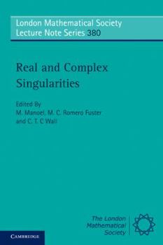Paperback Real and Complex Singularities Book