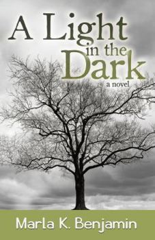 Paperback A Light in the Dark Book