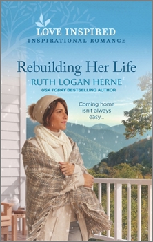 Mass Market Paperback Rebuilding Her Life Book