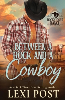 Paperback Between a Rock and a Cowboy Book