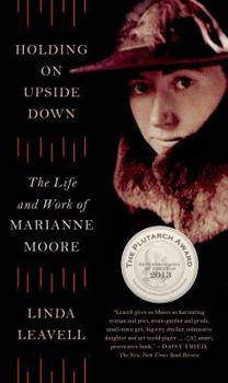 Paperback Holding on Upside Down: The Life and Work of Marianne Moore Book