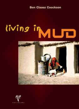 Paperback Living in Mud Book