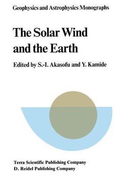 Paperback The Solar Wind and the Earth Book