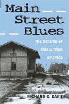 Paperback Main Street Blues: The Decline of Small-Town America Book