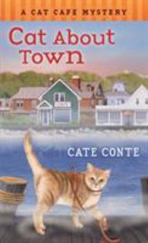 Mass Market Paperback Cat about Town: A Cat Cafe Mystery Book
