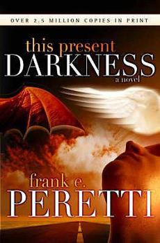 Paperback This Present Darkness Book