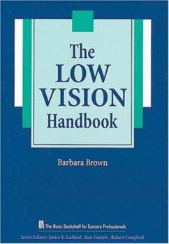 Paperback The Low Vision Handbook [Large Print] Book