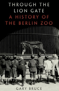 Paperback Through the Lion Gate: A History of the Berlin Zoo Book
