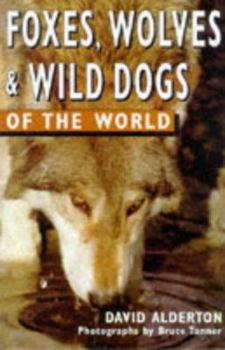 Paperback Foxes, Wolves, and Wild Dogs of the World Book