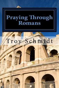 Paperback Praying Through Romans Book