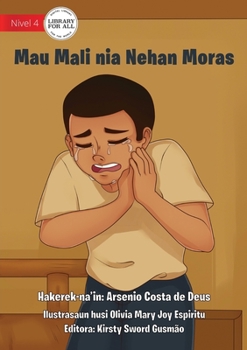 Paperback Mau Mali Gets A Toothache - Mau Mali nia Nehan Moras [Tetum] Book