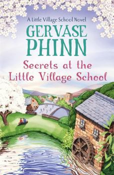 Paperback Secrets at the Little Village School Book