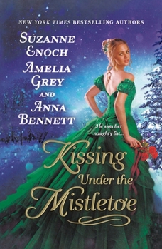 Paperback Kissing Under the Mistletoe Book