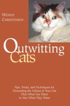 Paperback Outwitting Cats: Tips, Tricks and Techniques for Persuading the Felines in Your Life That What You Want Is Also What They Want Book
