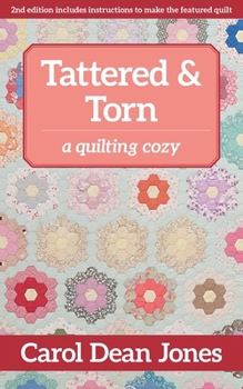 Paperback Tattered & Torn: A Quilting Cozy Book