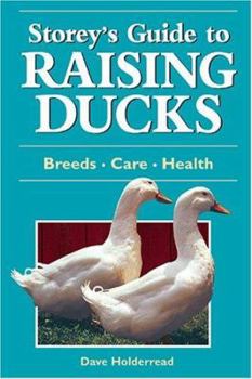 Paperback Raising Ducks Book