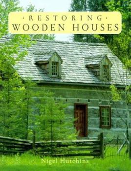 Paperback Restoring Wooden Houses Book