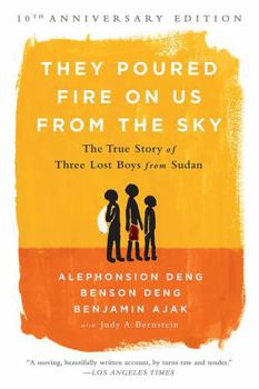 Paperback They Poured Fire on Us from the Sky: The True Story of Three Lost Boys from Sudan Book