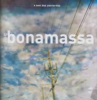 Music - CD A New Day Yesterday Book