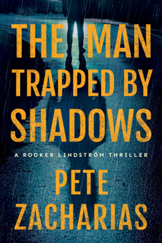 Paperback The Man Trapped by Shadows Book