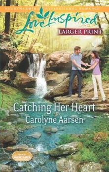 Mass Market Paperback Catching Her Heart [Large Print] Book