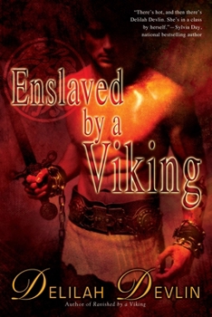 Paperback Enslaved by a Viking Book