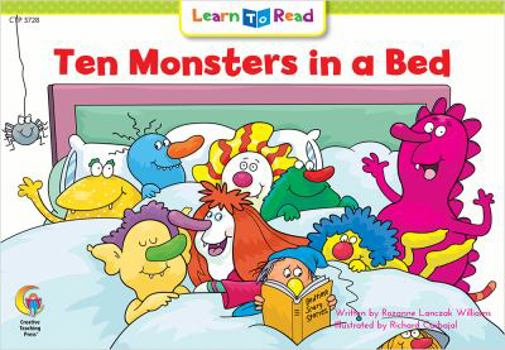 Paperback Ten Monsters in a Bed Book