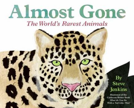 Hardcover Almost Gone: The World's Rarest Animals Book