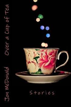 Paperback Over a Cup of Tea: Stories Book