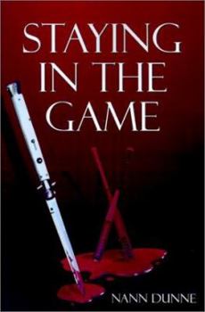 Paperback Staying in the Game Book