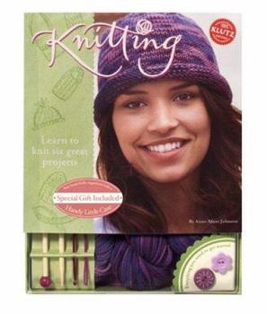 Paperback Knitting: Learn to Knit Six Great Projects [With Knitting Needles, Crochet Hook, 210 Yards of Yarn and 2 Buttons] Book