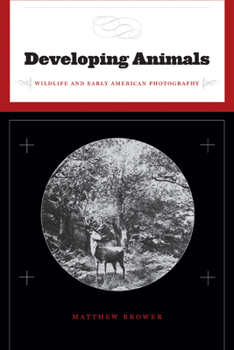 Paperback Developing Animals: Wildlife and Early American Photography Book