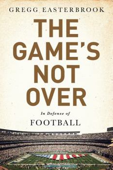 Paperback The Game's Not Over: In Defense of Football Book