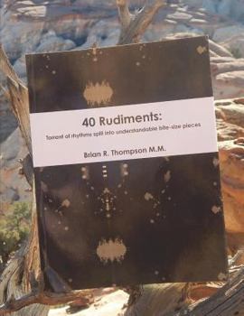 Paperback 40 Rudiments: Torrent of Rhythm Split Into Understandable Bite-Size Pieces Book