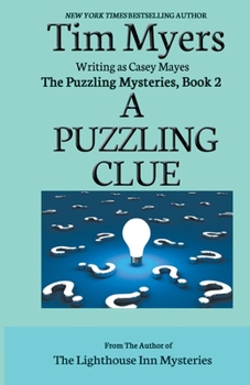 Paperback A Puzzling Clue Book