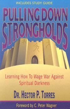 Paperback Pulling Down Strongholds: Learning How to Wage War Against Spiritual Darkness Book