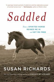 Paperback Saddled: How a Spirited Horse Reined Me in and Set Me Free Book