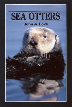 Paperback Sea Otters Book